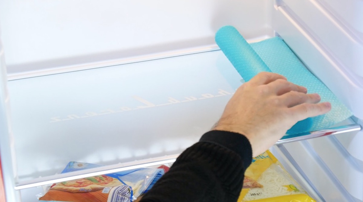 mettre un tapis de protection dans le frigo